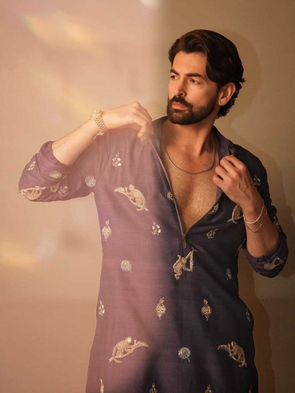 Regal Violet Heavy Embroidered Kurta Pajama.
